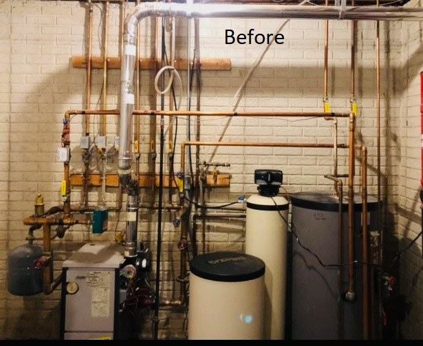 The outdated boiler system and piping before the makeover